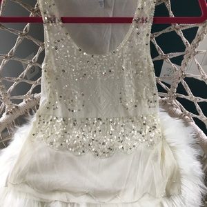 Sheer cream sparkly top